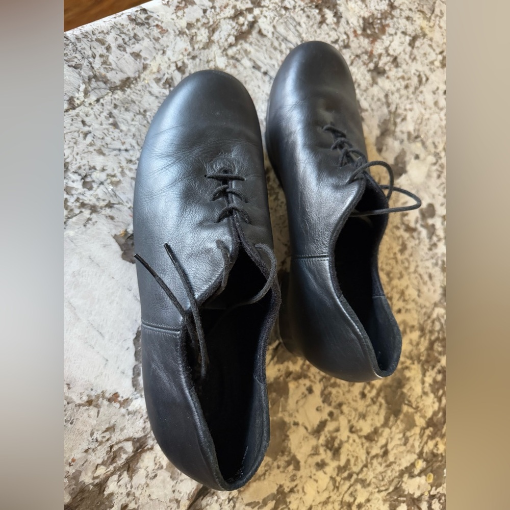 Men’s leather Capezio taps. Worn for 2 performances only for a school show.